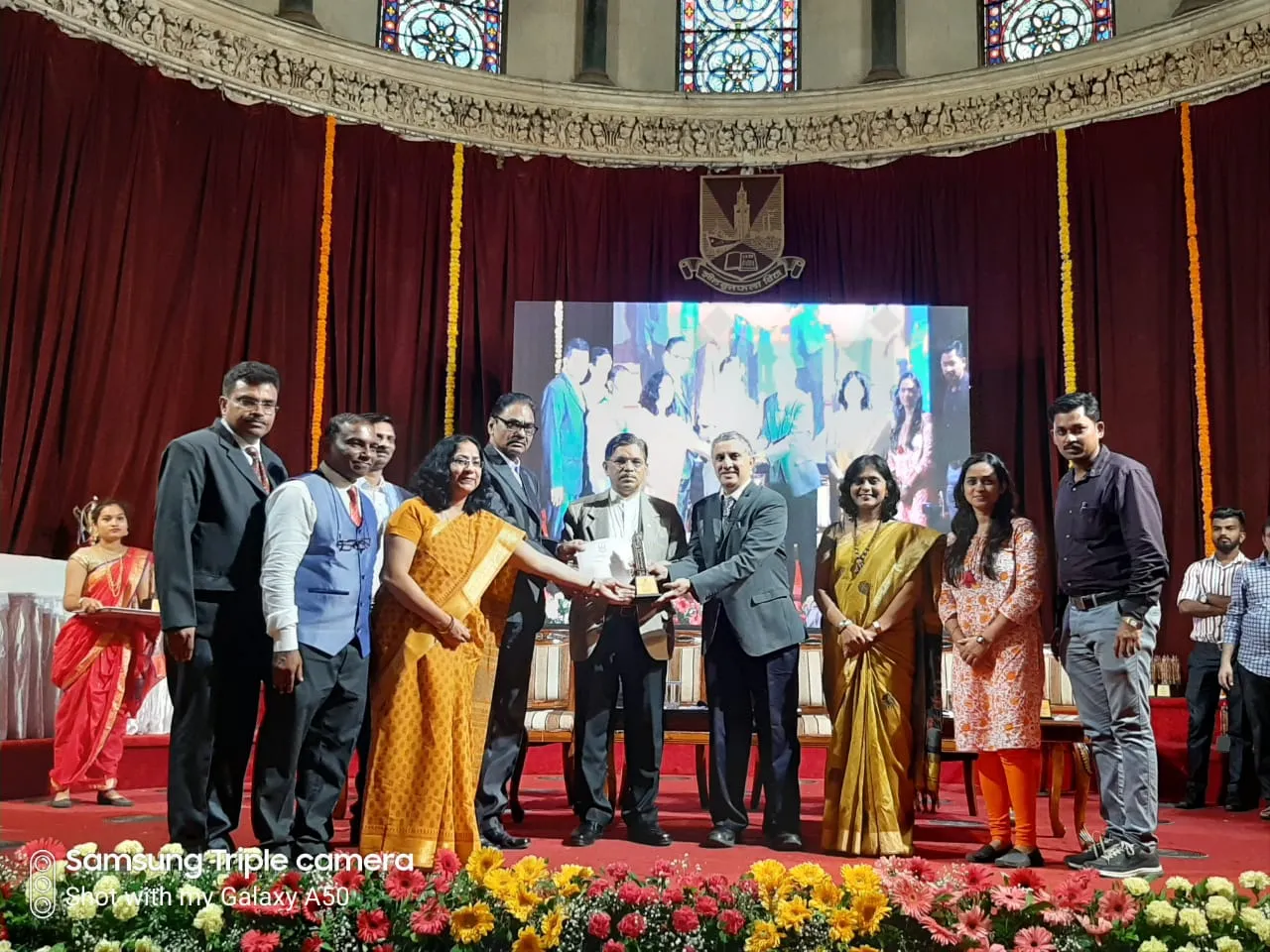 Hon. Principal and Chairperson Avishkar receiving district chaimpion trophy 2018-19